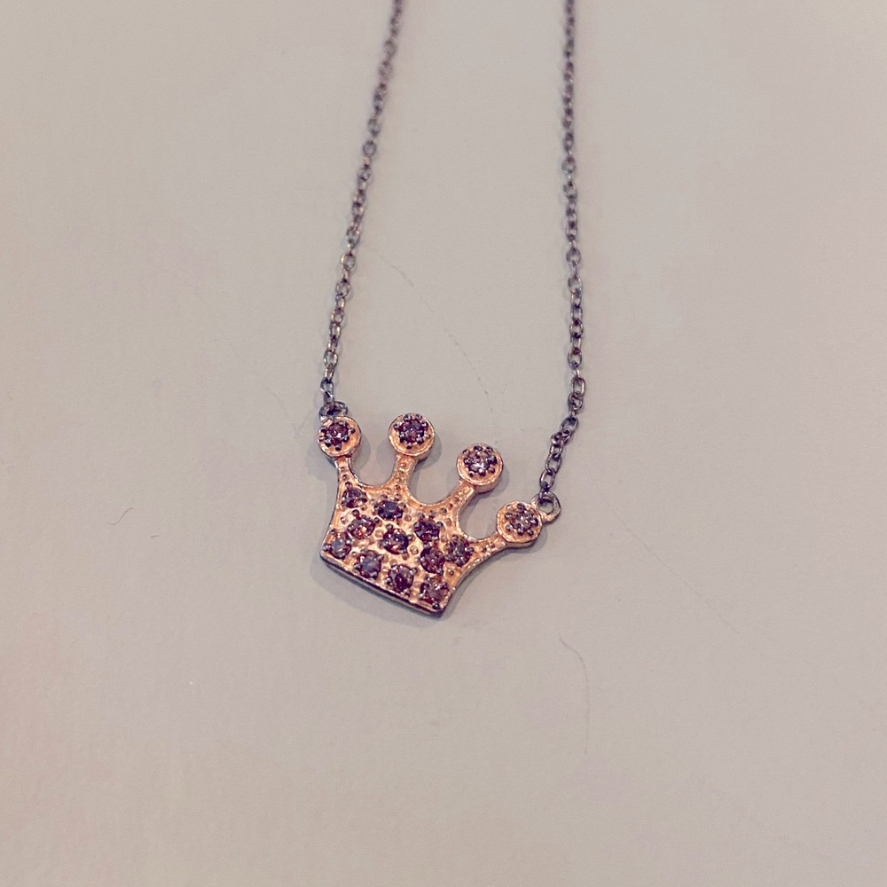 Rose gold crown necklace with purple stones